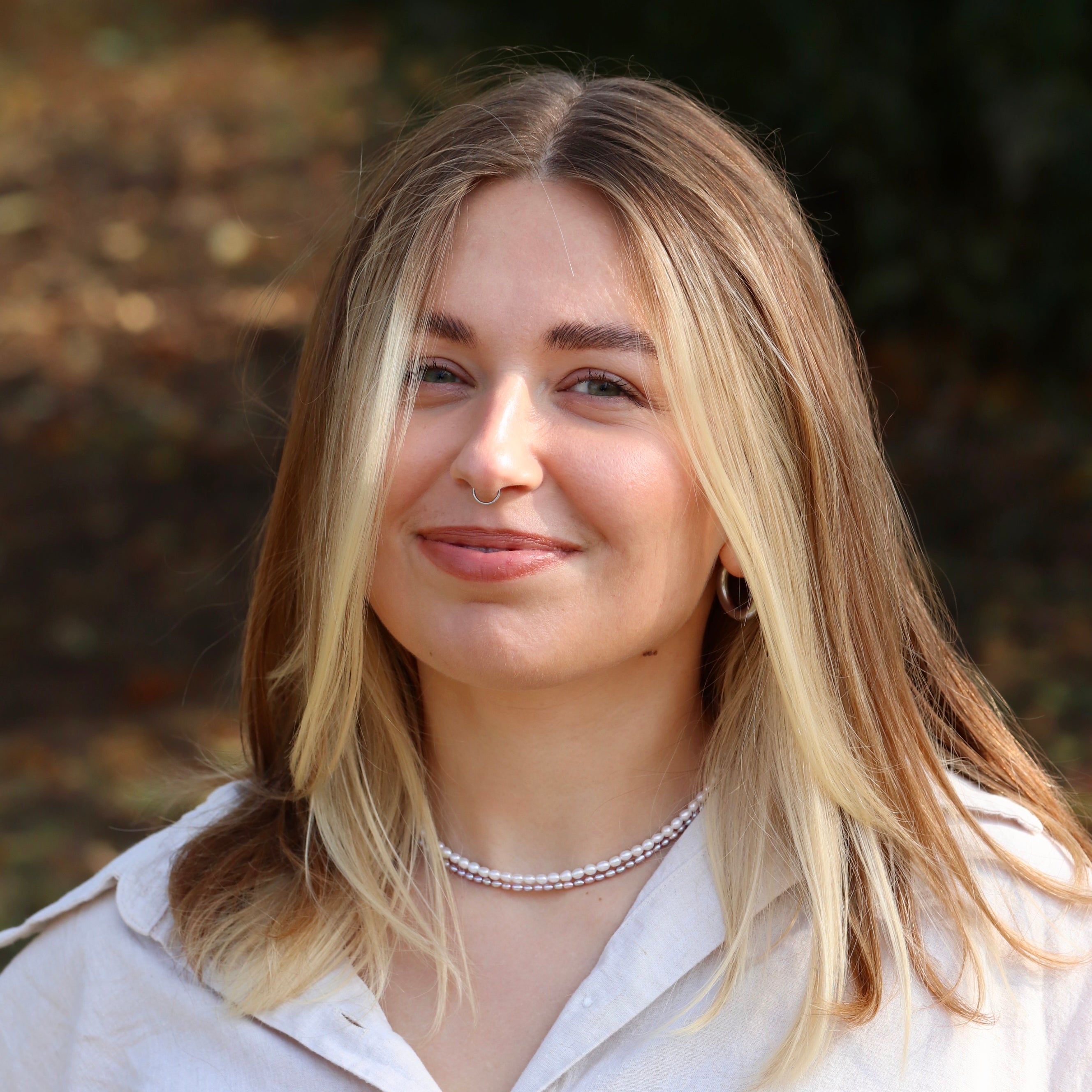 Bride wearing rose freshwater pearl necklace, elegant handmade wedding jewelry, perfect for bridal or bridesmaid gifts