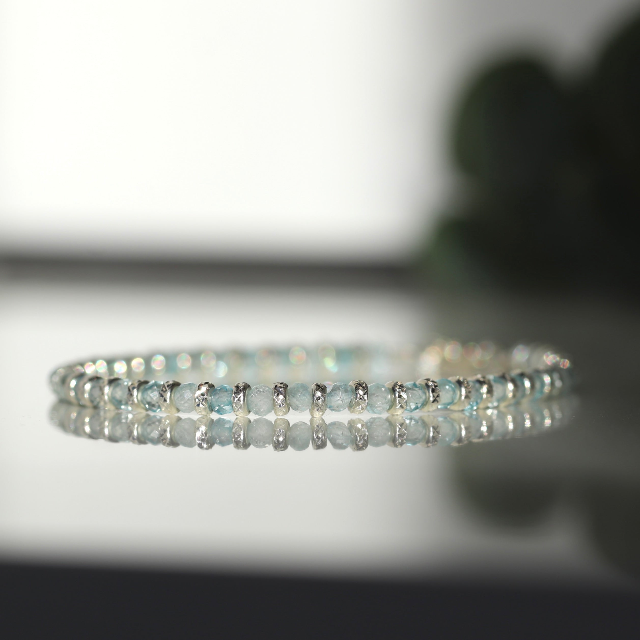 Dainty Blue Topaz bracelet with shimmering 925 silver beads, timeless handcrafted design