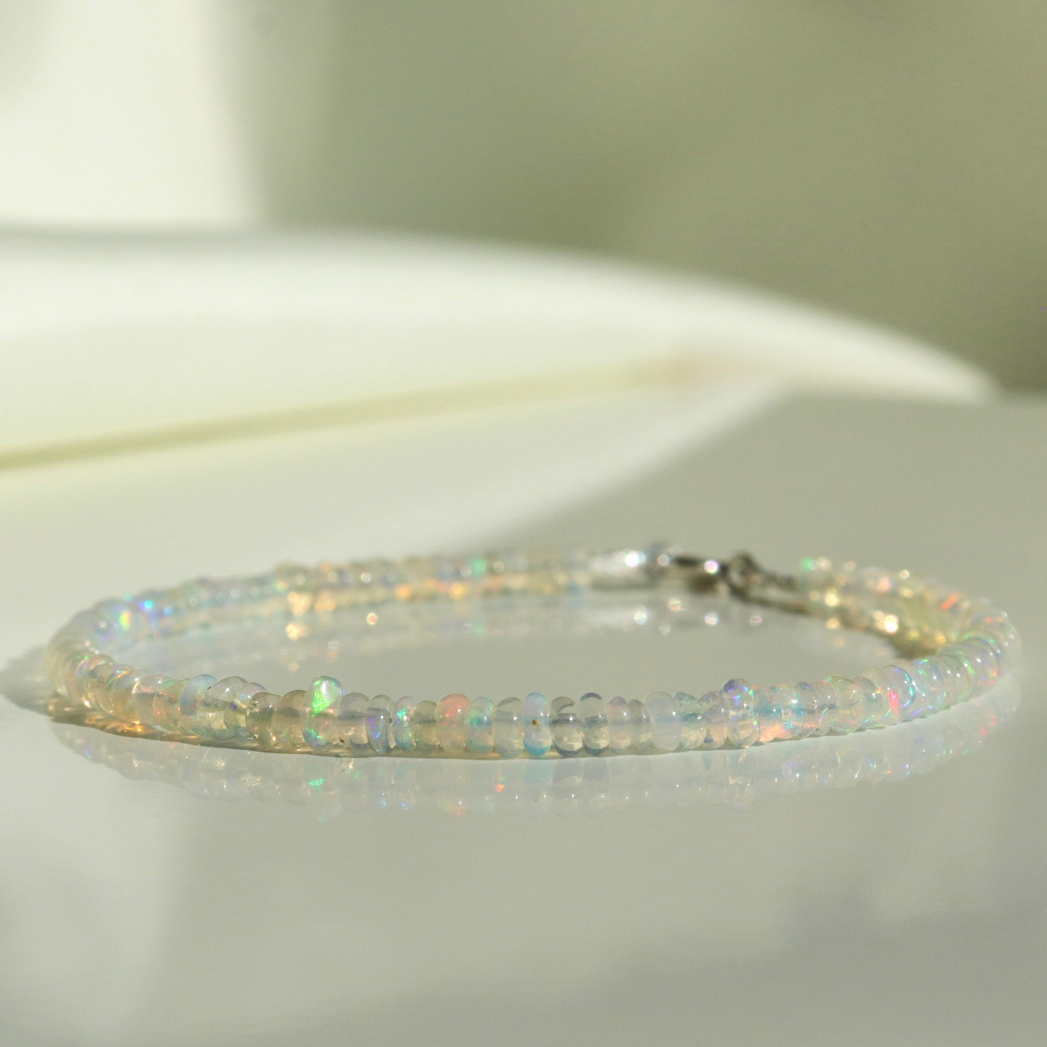 Dainty Ethiopian Opal bracelet, elegant handcrafted jewelry featuring natural color variations