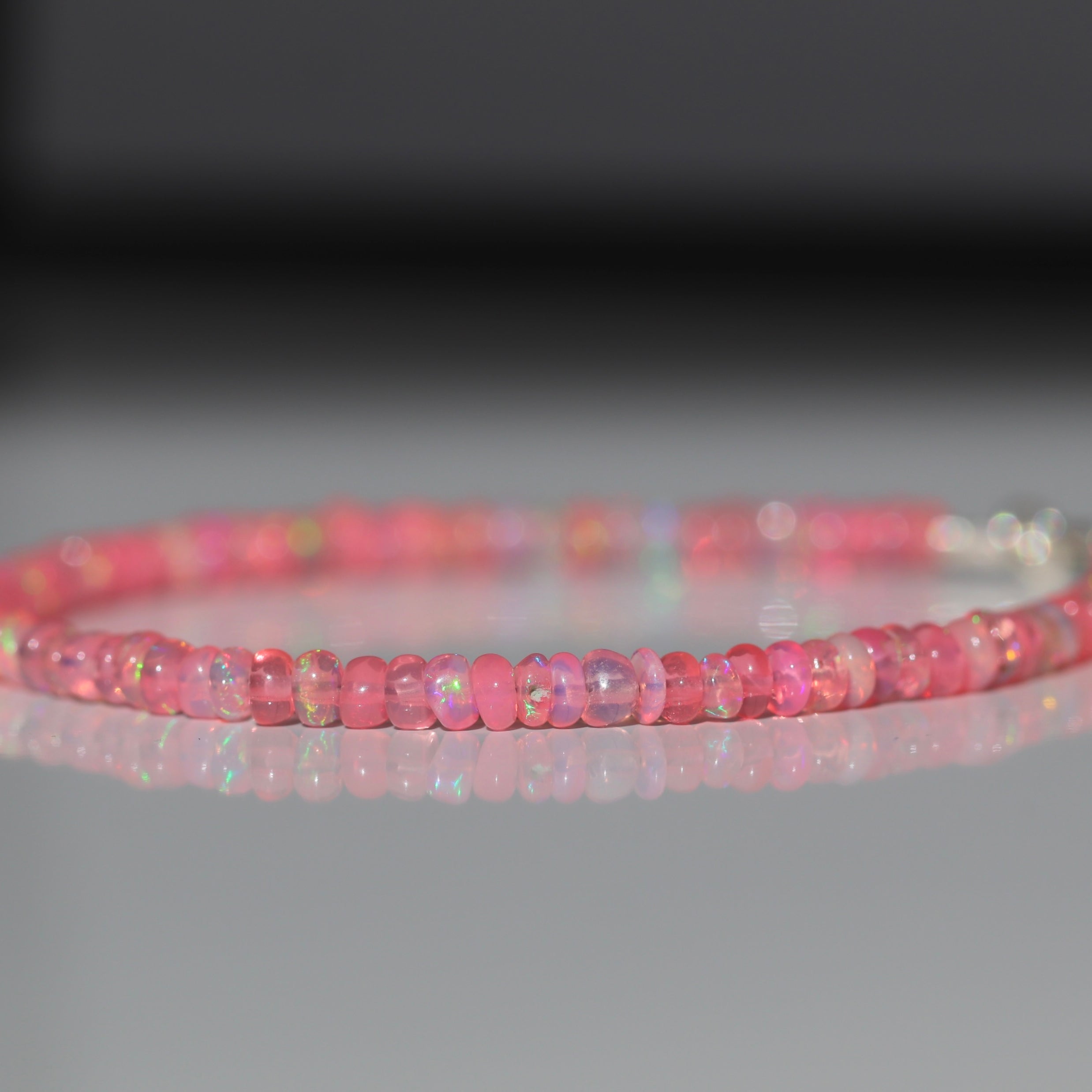 Dainty Fire Pink Opal bracelet by Oberia Jewelry, handmade with elegant minimalist design