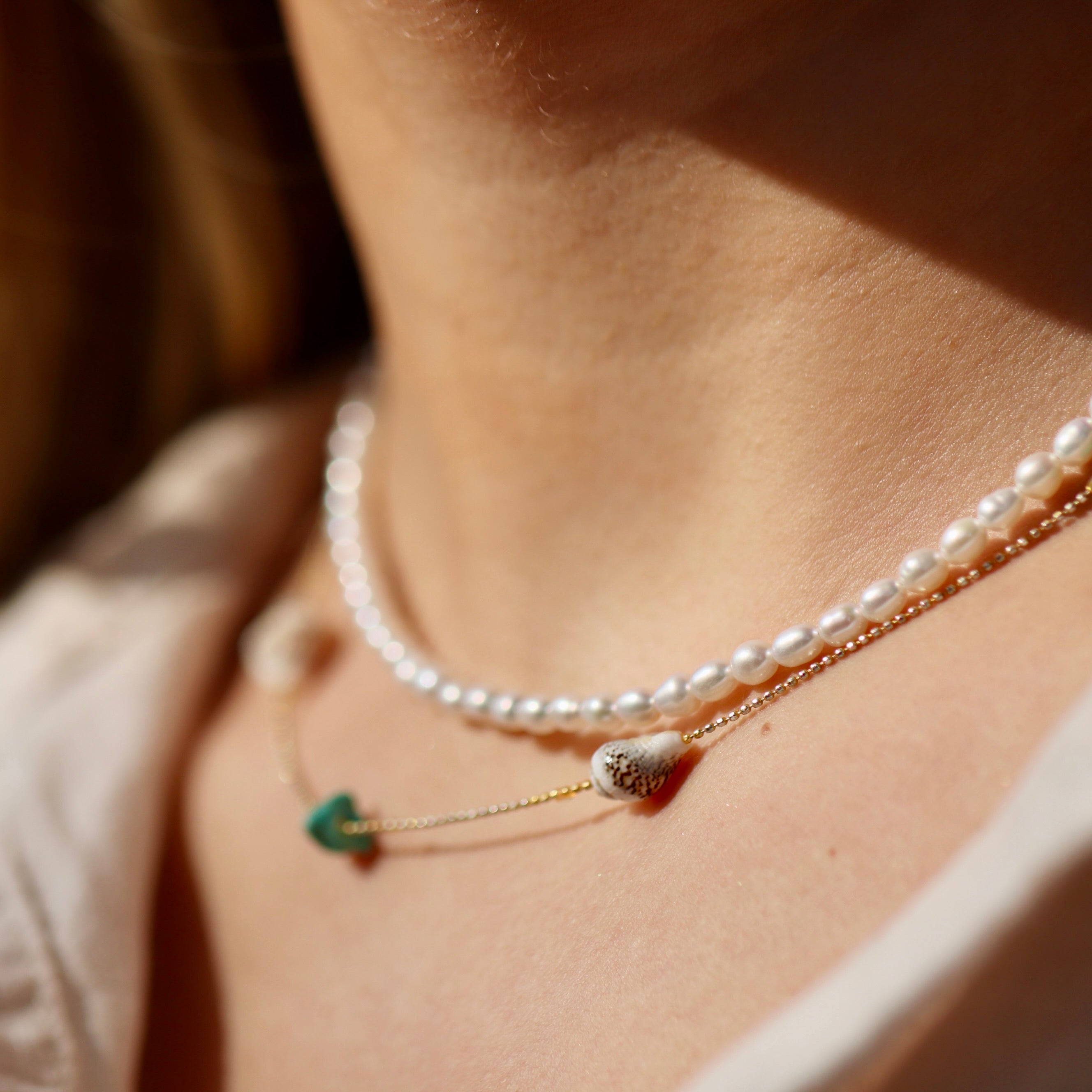 Dainty freshwater rice pearl necklace with gold filled details by Oberia Jewelry