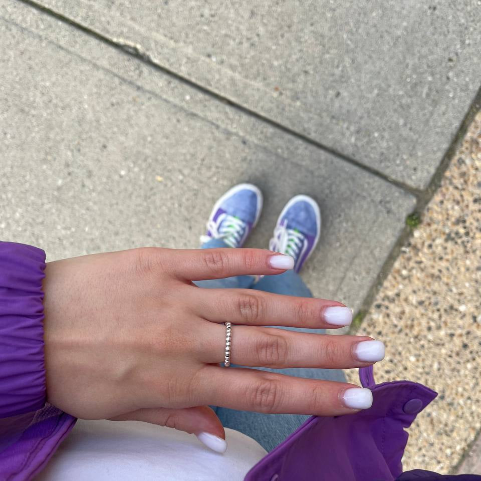 Dainty elastic ring featuring 14k gold filled and silver beads, refined handcrafted design