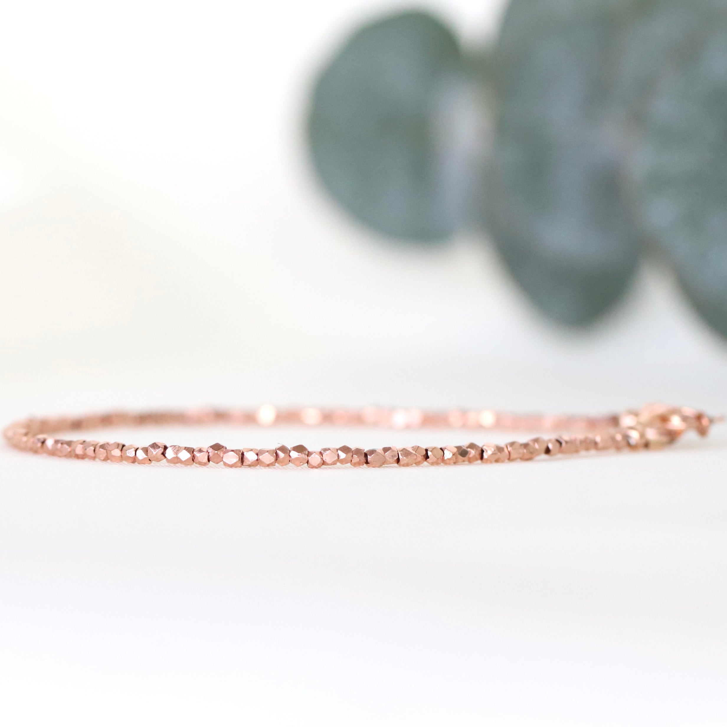 Dainty Karen Hill Tribe bead bracelet featuring 24k Rose Gold Vermeil accents