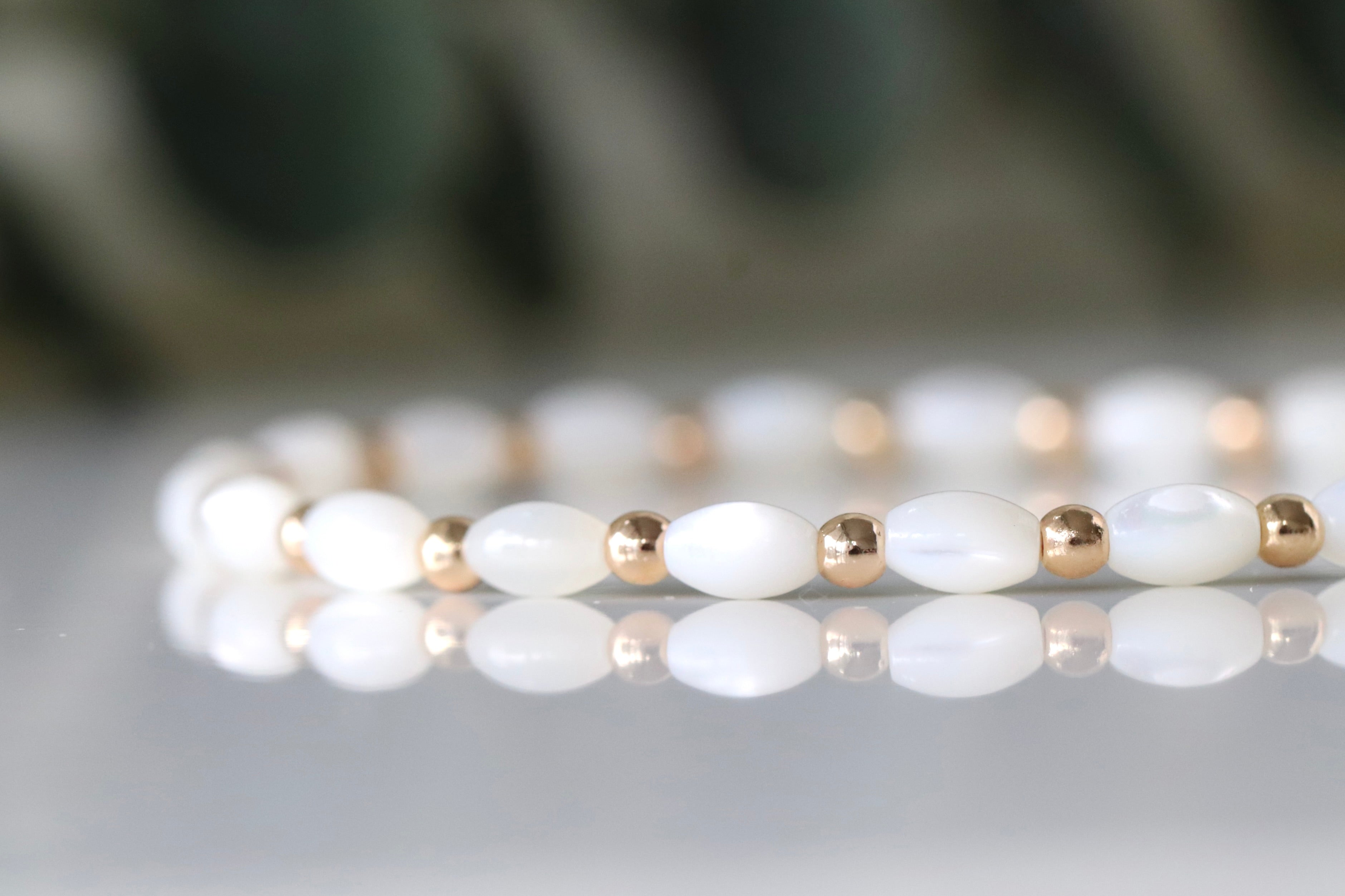 Dainty Mother of Pearl bracelet with golden beads
