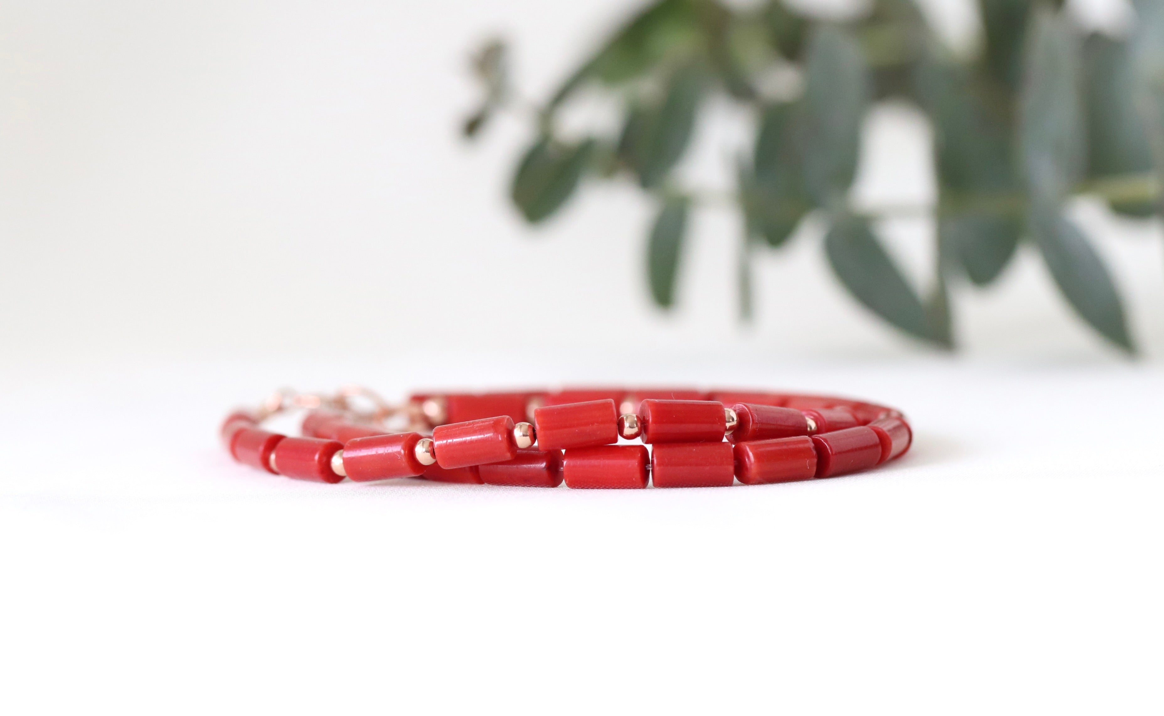 Dainty Red Coral bracelet featuring rose gold accents, timeless handmade jewelry
