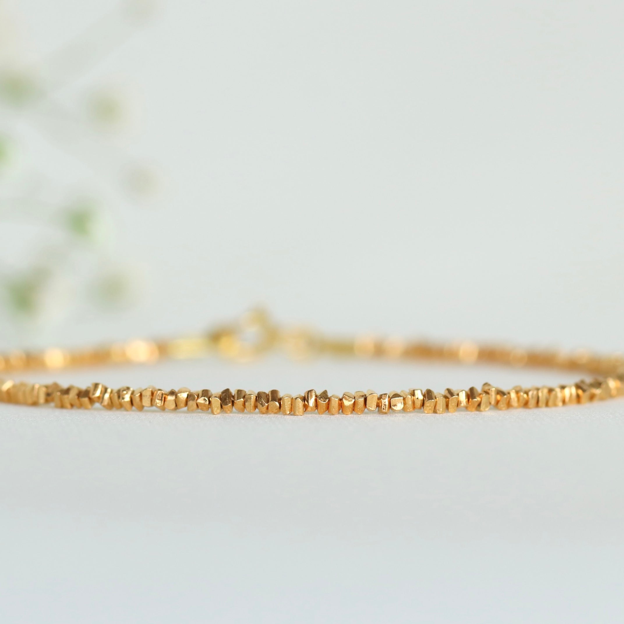 Dainty thin Karen Hill Tribe bracelet in 24k gold vermeil, elegant handcrafted design