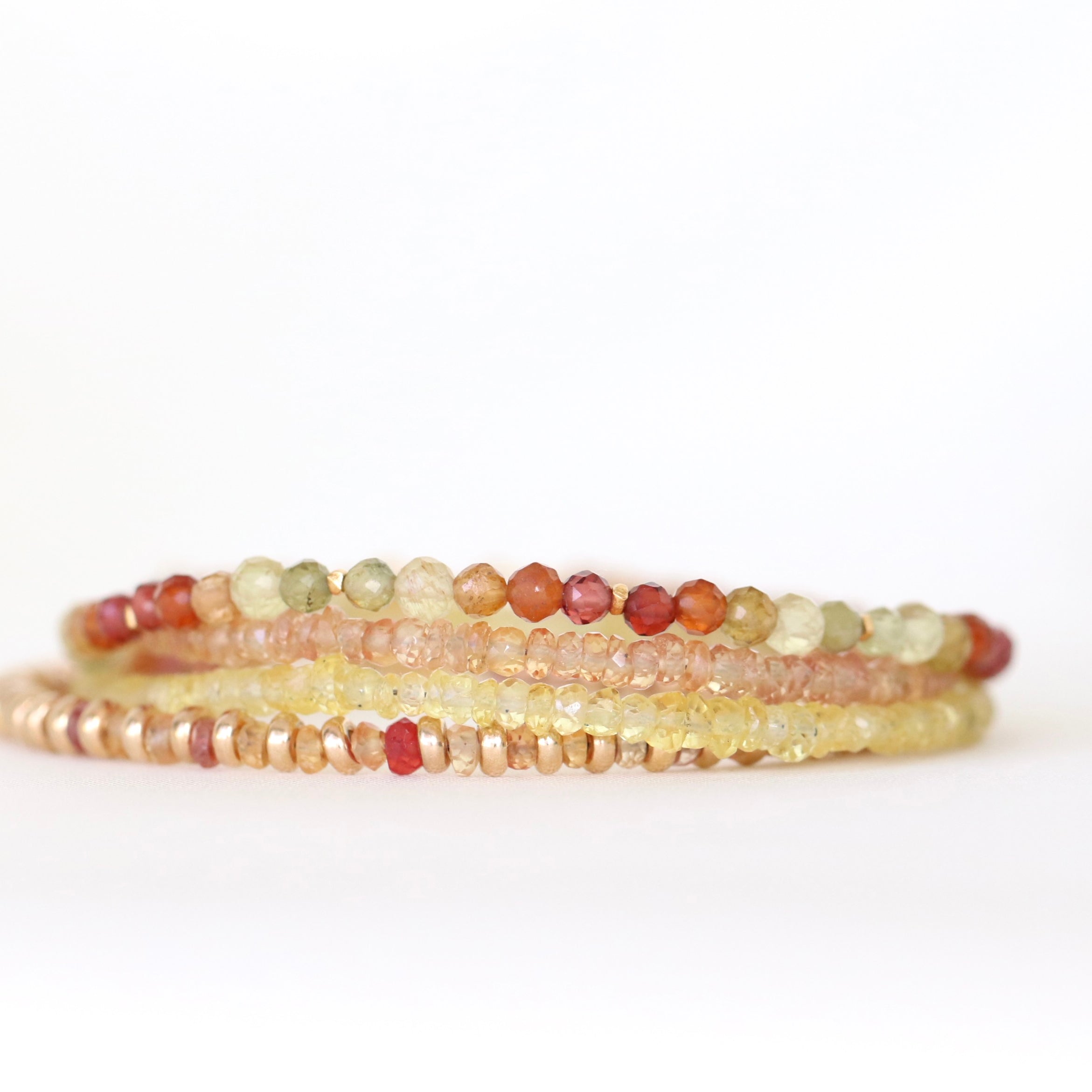 Dainty Yellow Apatite bracelet featuring Garnet, Tourmaline & Malaya Garnet, handcrafted design