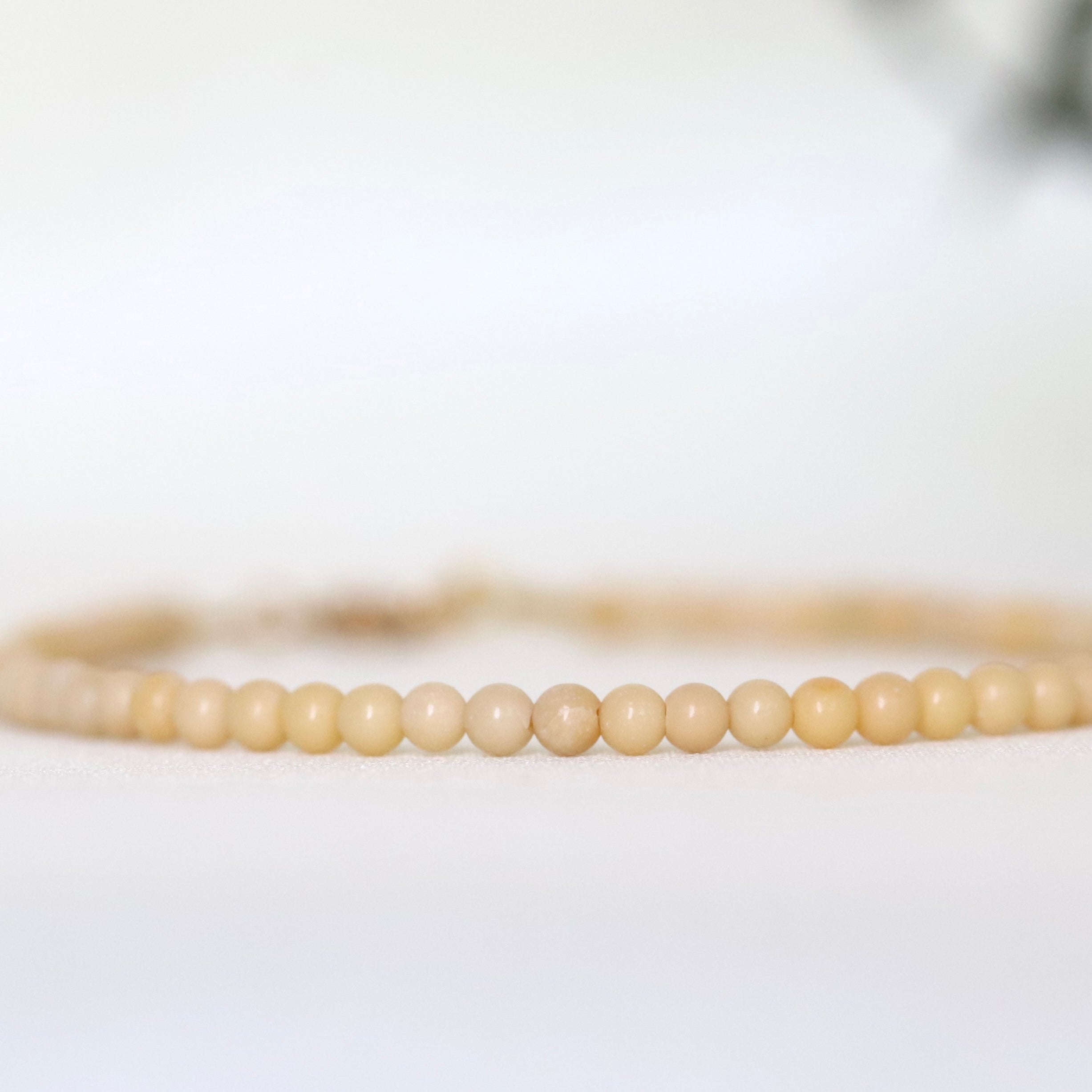 Elegant Butter Yellow Jade bracelet, minimalist gemstone design by Oberia Jewelry