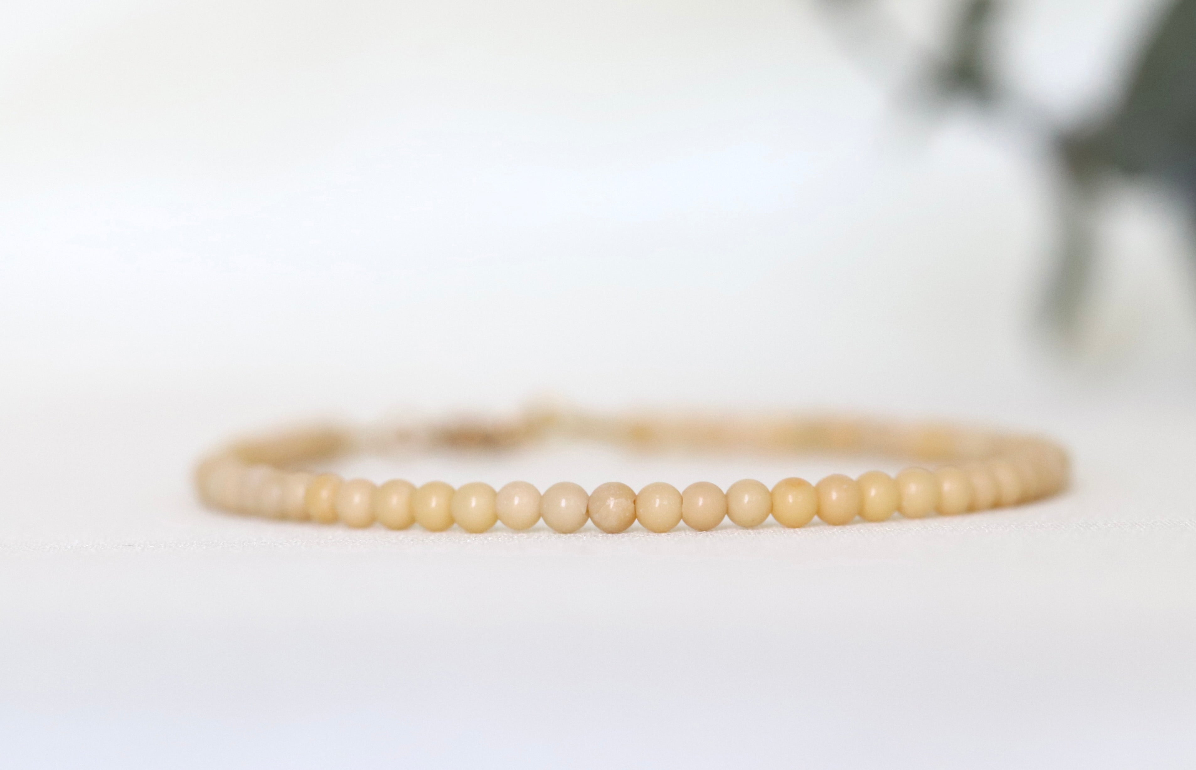 Elegant Butter Yellow Jade bracelet, minimalist gemstone design by Oberia Jewelry