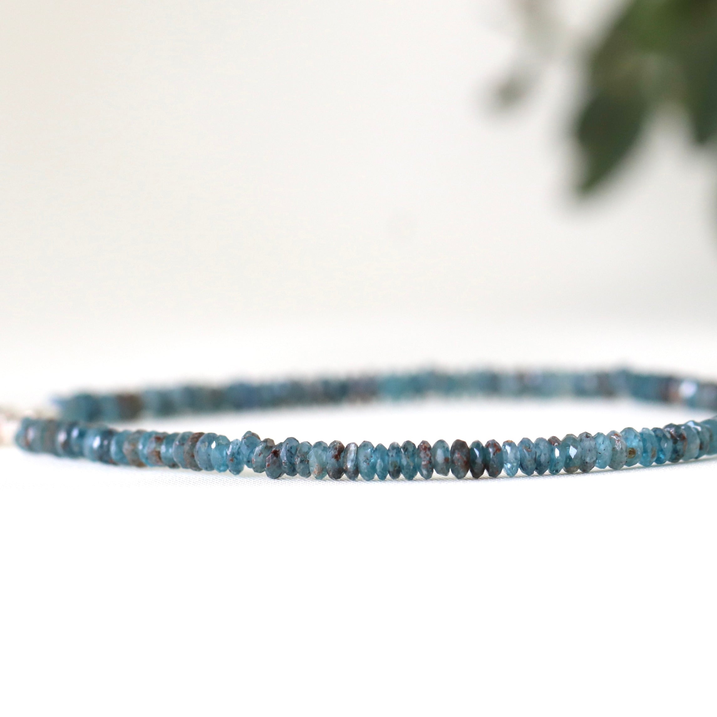 Elegant Dark Teal Blue Kyanite bracelet, minimalist design highlighting the gemstone’s luster