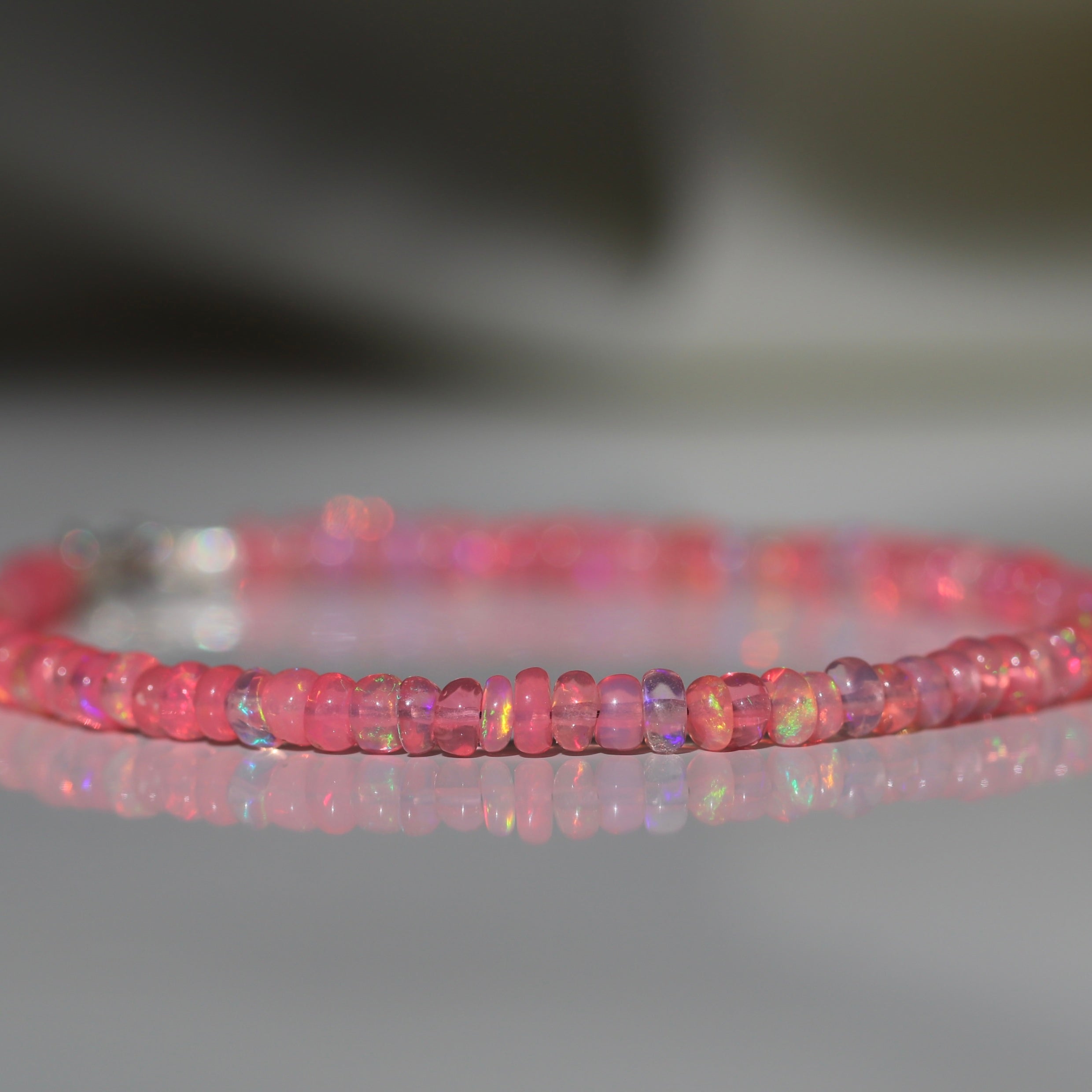 Elegant Fire Pink Opal bracelet by Oberia Jewelry