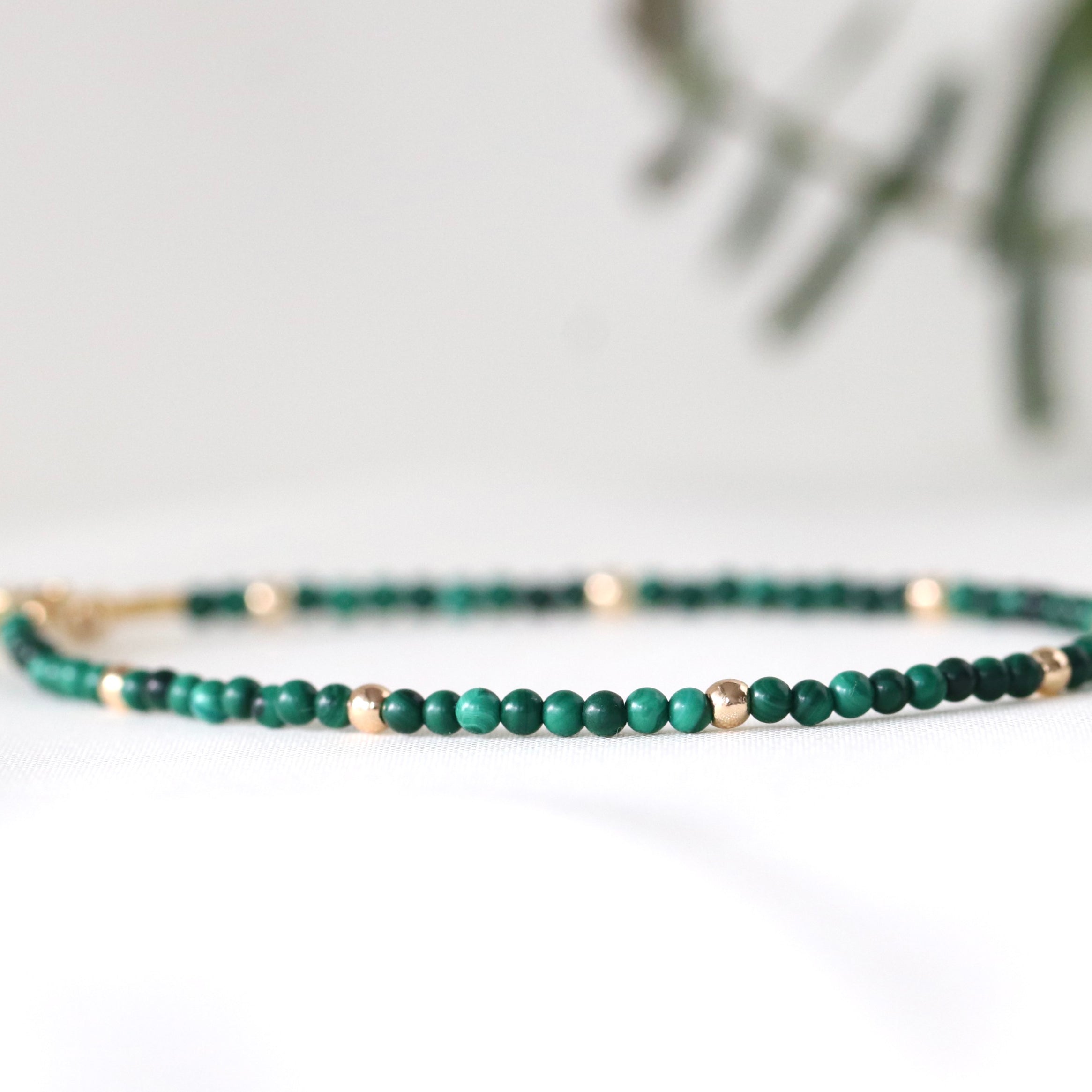 Handmade malachite bracelet with 14k gold filled beads, a timeless minimalist design by Oberia Jewelry