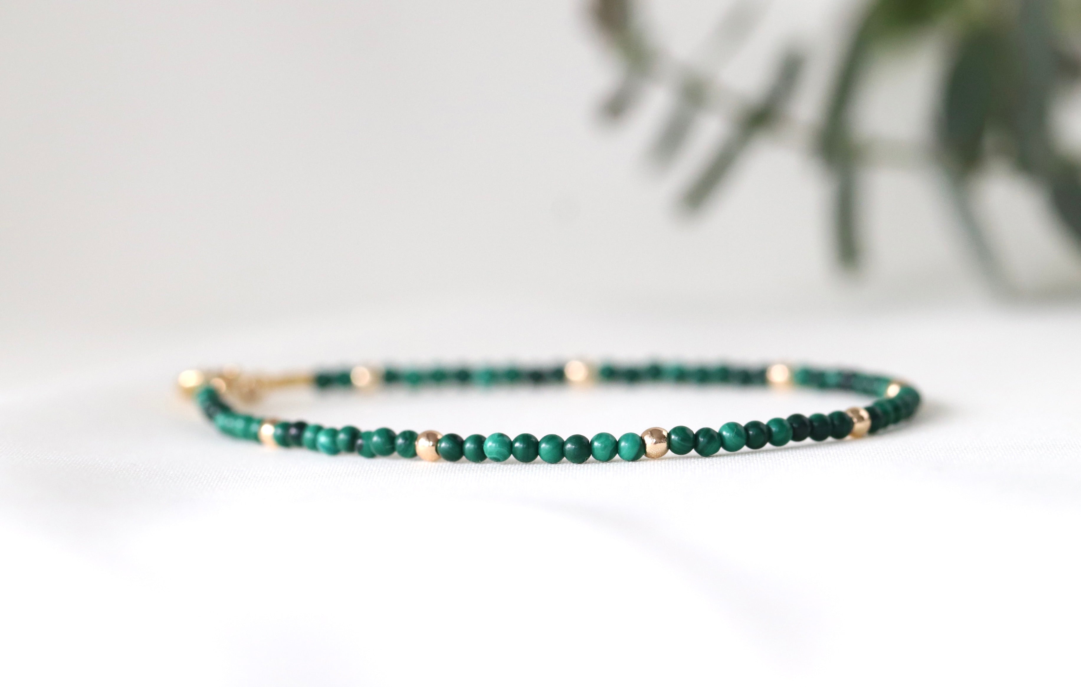 Handmade malachite bracelet with 14k gold filled beads, a timeless minimalist design by Oberia Jewelry