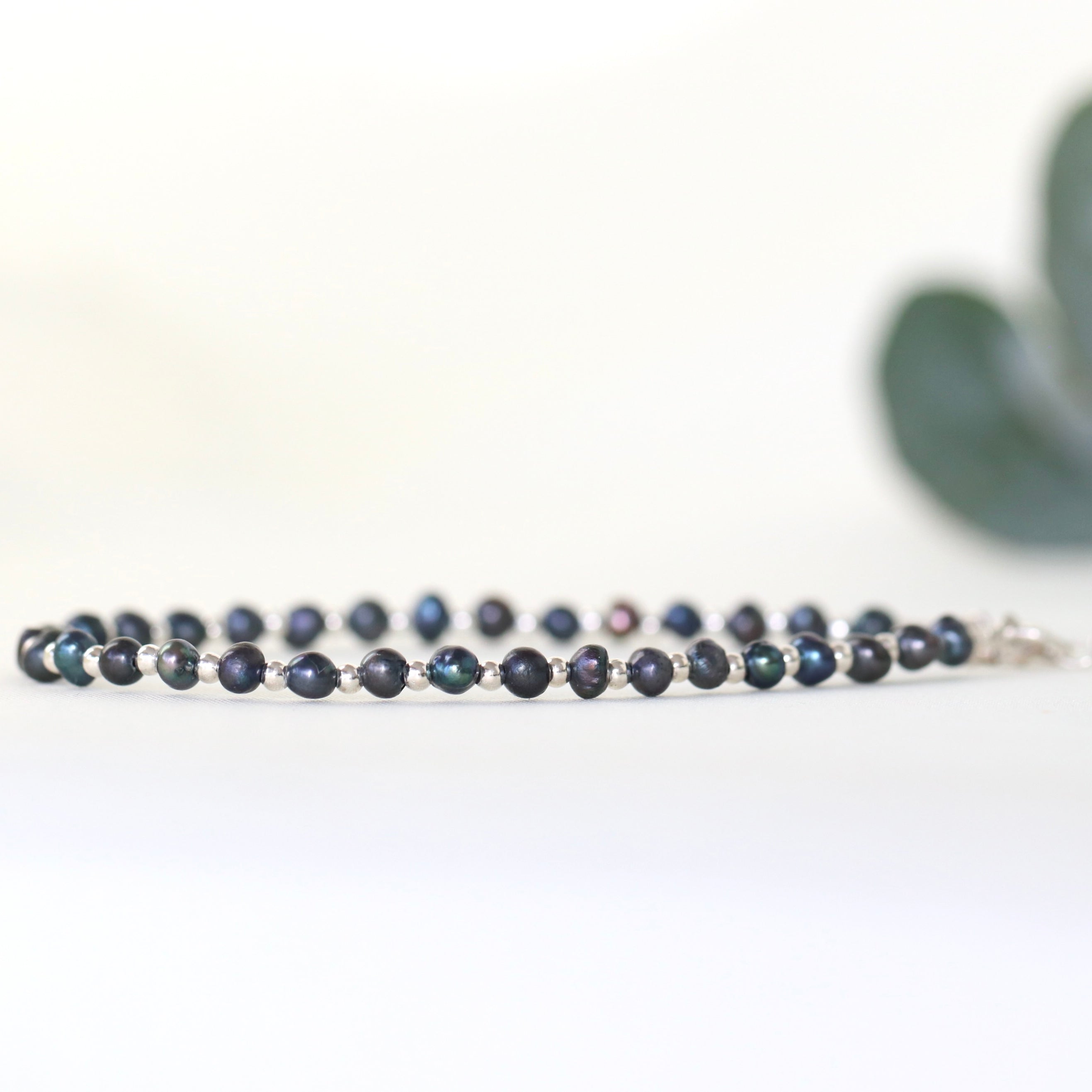 Handmade Tahitian Black Pearl bracelet with 925 sterling silver beads by Oberia Jewelry