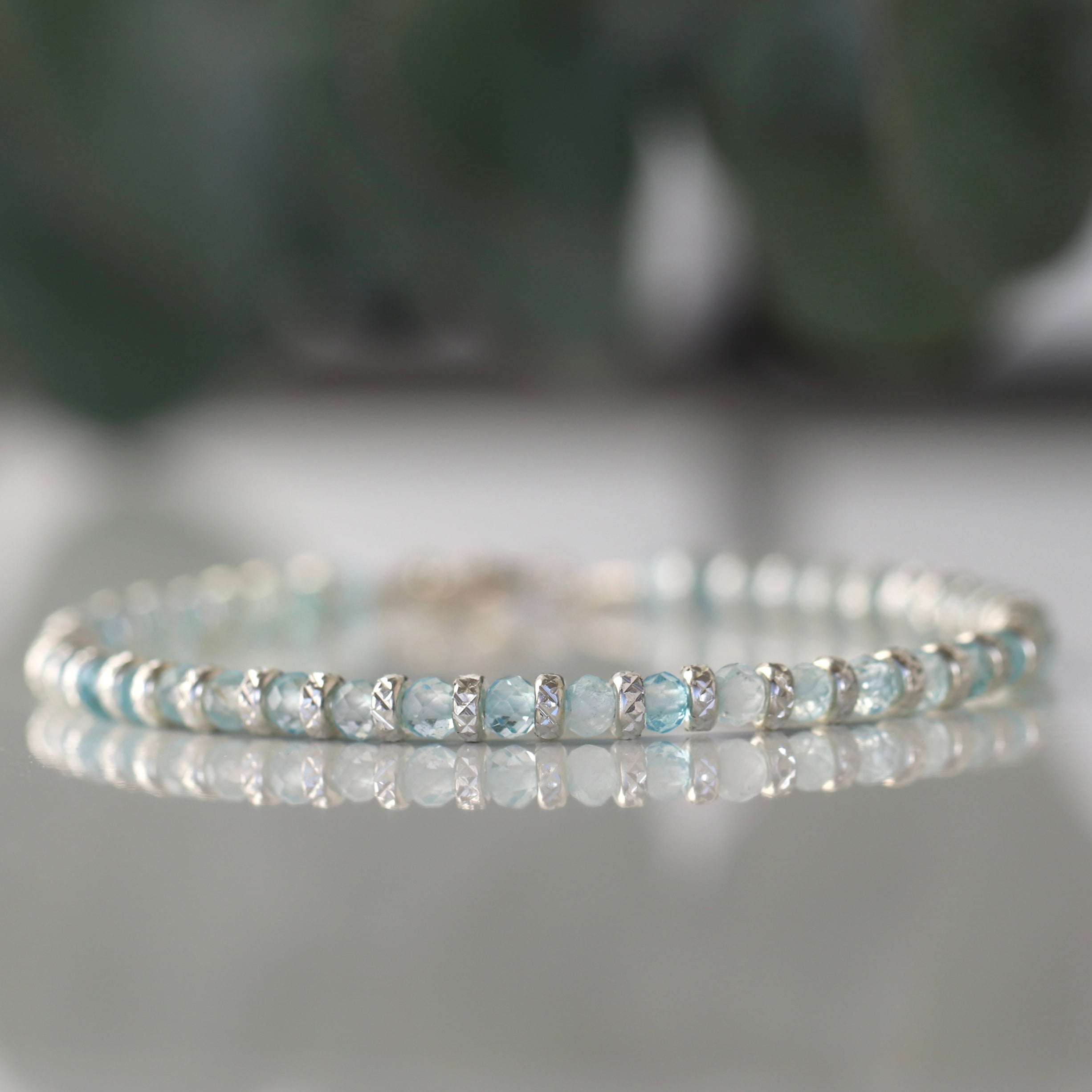 Minimalist Blue Topaz bracelet featuring silver sparkling beads, delicate and timeless