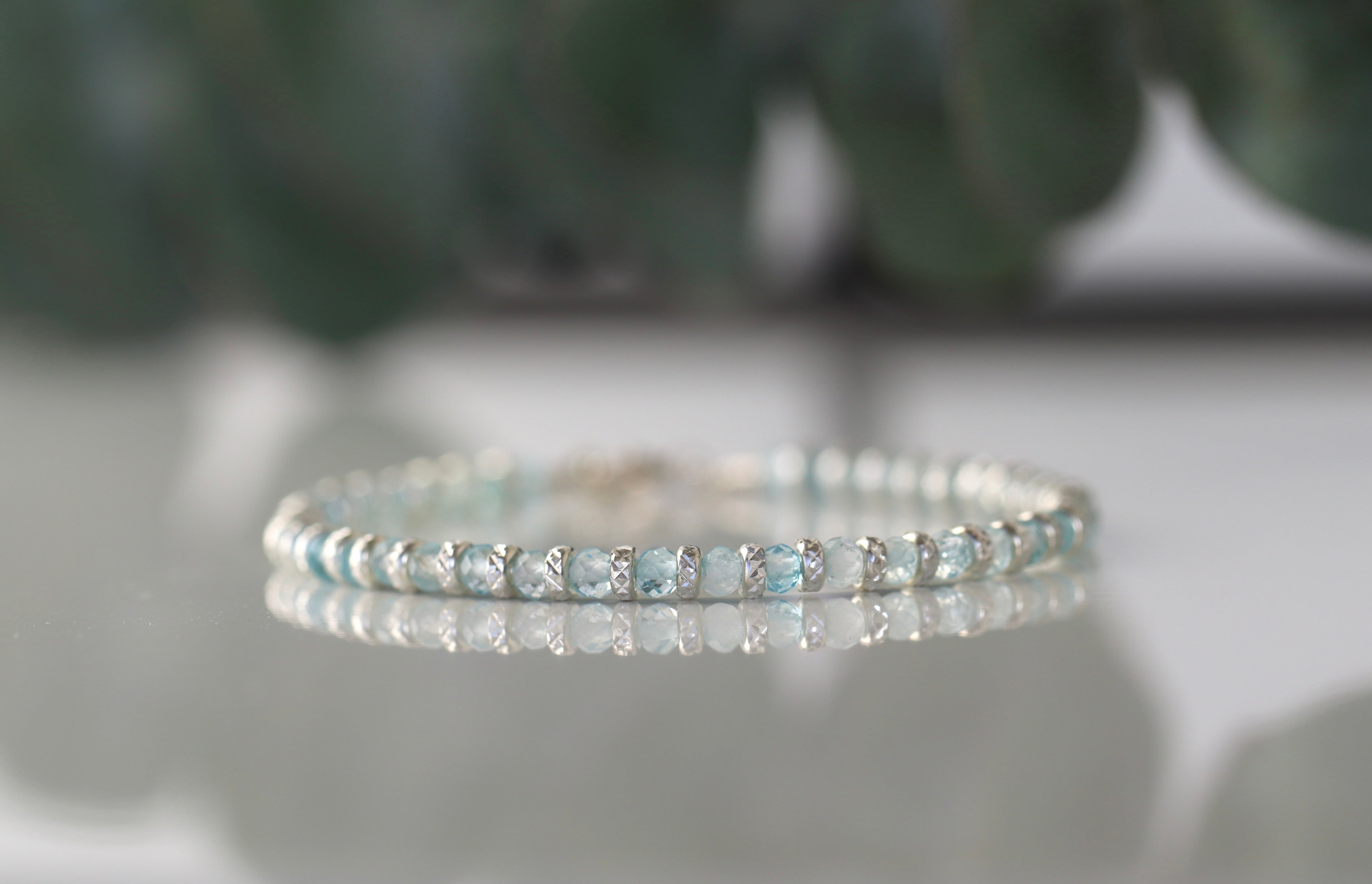 Minimalist Blue Topaz bracelet featuring silver sparkling beads, delicate and timeless