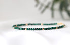 Minimalist malachite bracelet with gold accents, perfect for everyday elegance by Oberia Jewelry