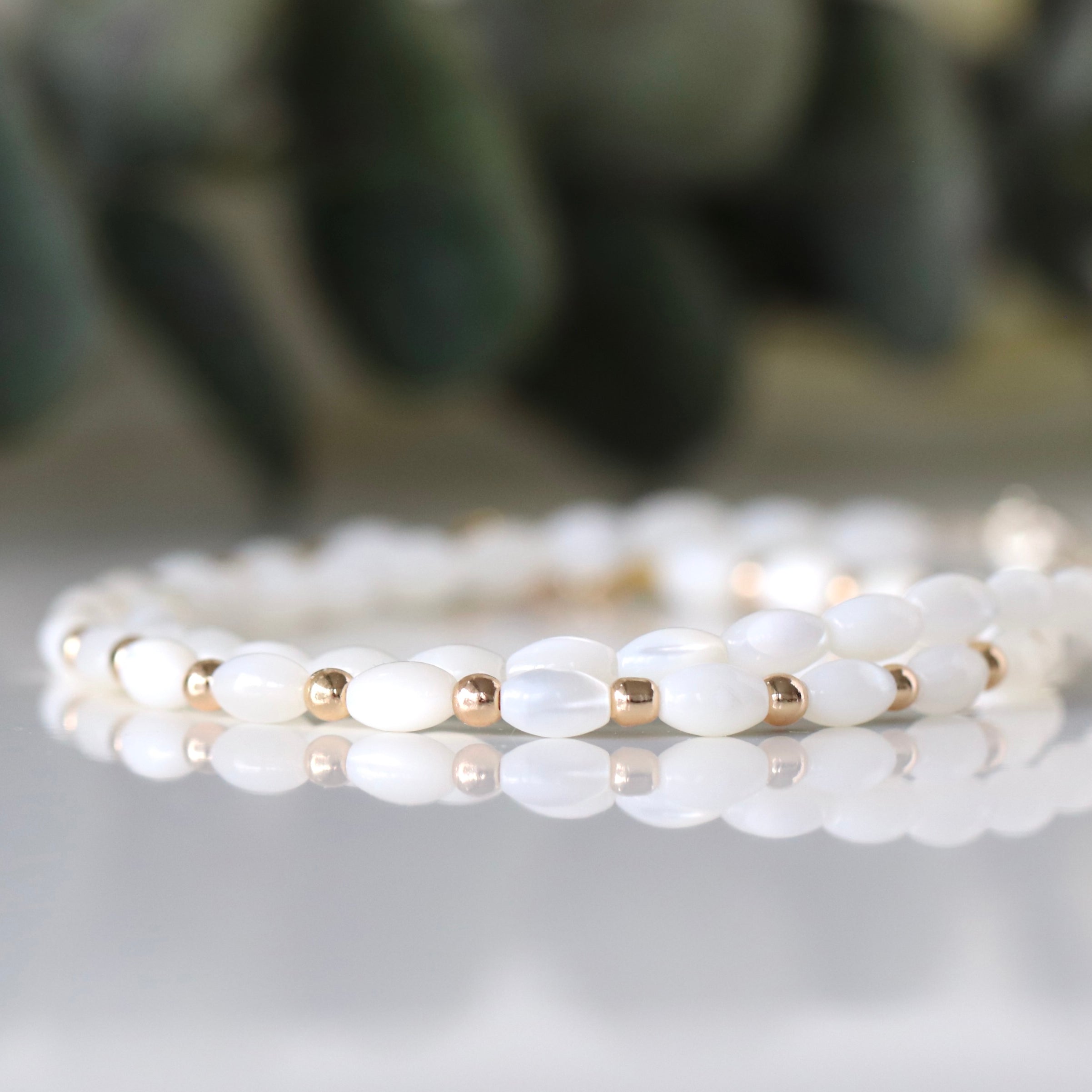 Minimalist Mother of Pearl bracelet with subtle gold detailing