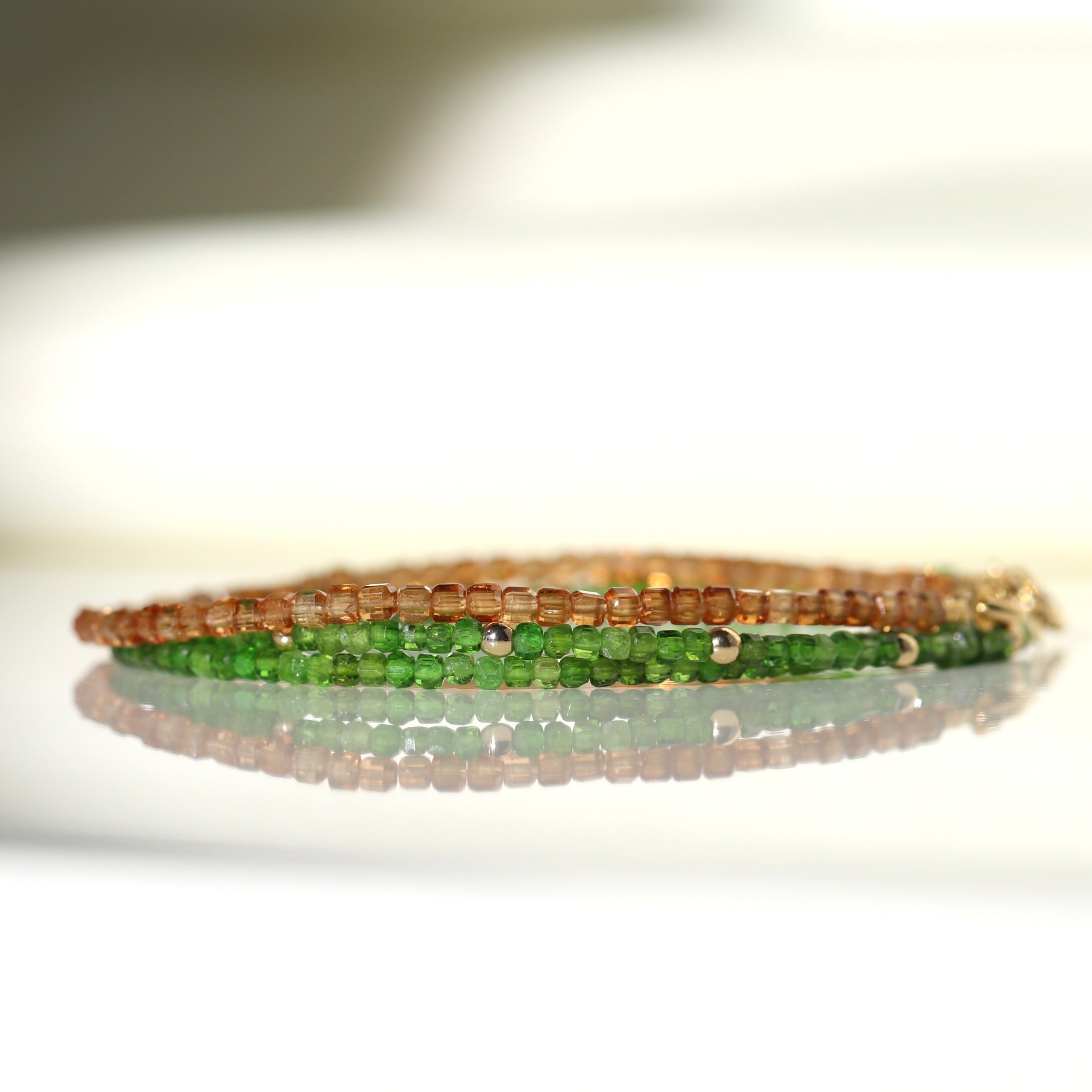 Minimalist Spessartine Garnet bracelet featuring 2mm cube orange gemstones