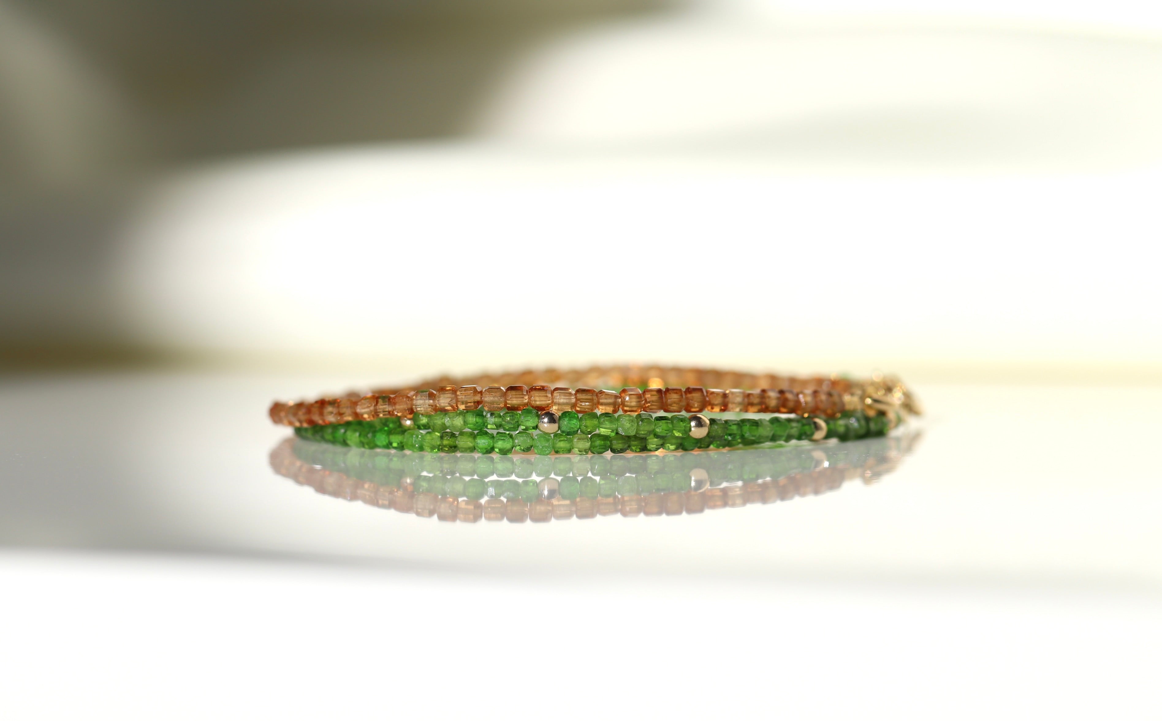 Minimalist Spessartine Garnet bracelet featuring 2mm cube orange gemstones