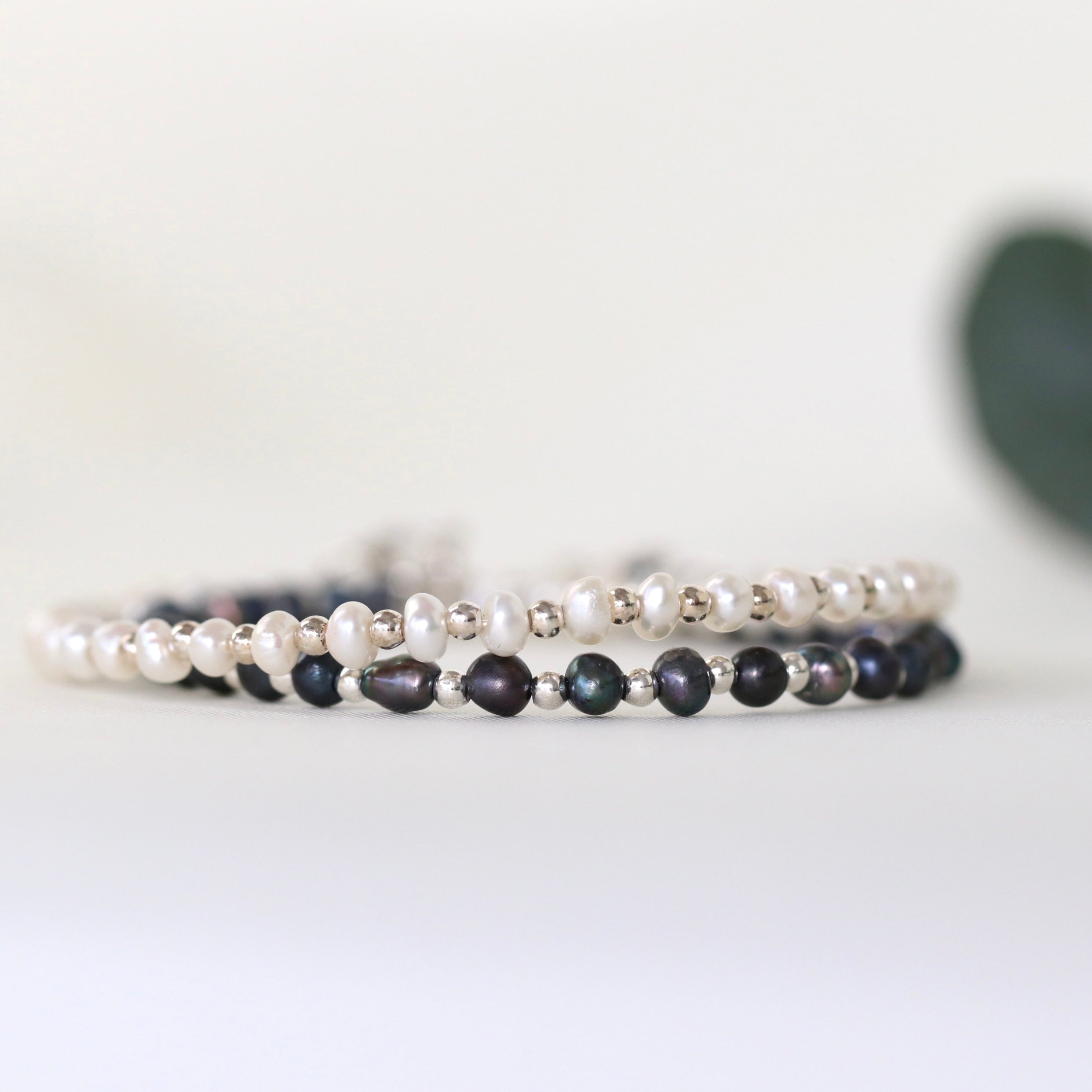 Minimalist Tahitian Black Pearl bracelet with sterling silver beads, refined handmade design