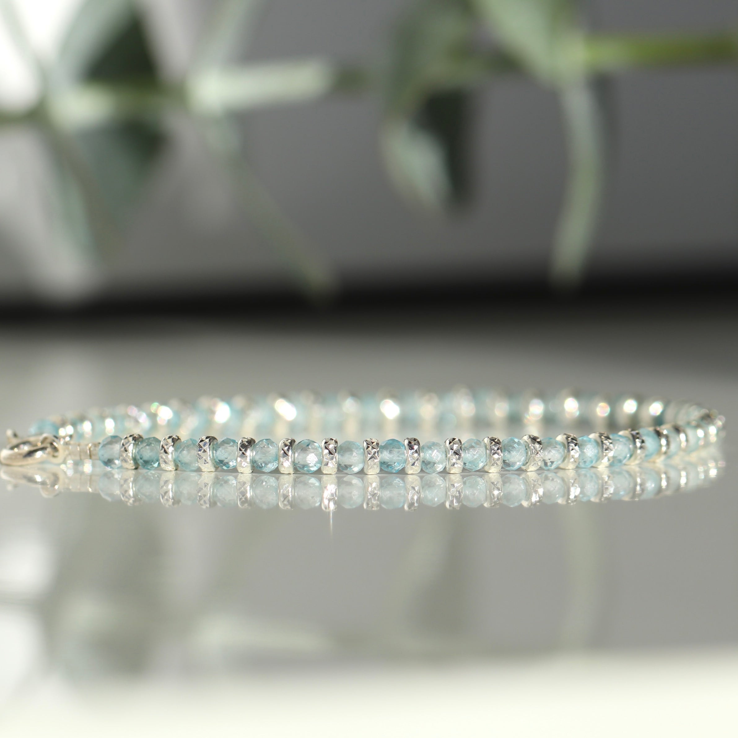 Sparkling Blue Topaz bracelet with silver details