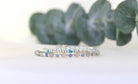 Blue Topaz bracelet with 925 sterling silver sparkling accents, handmade by Oberia Jewelry