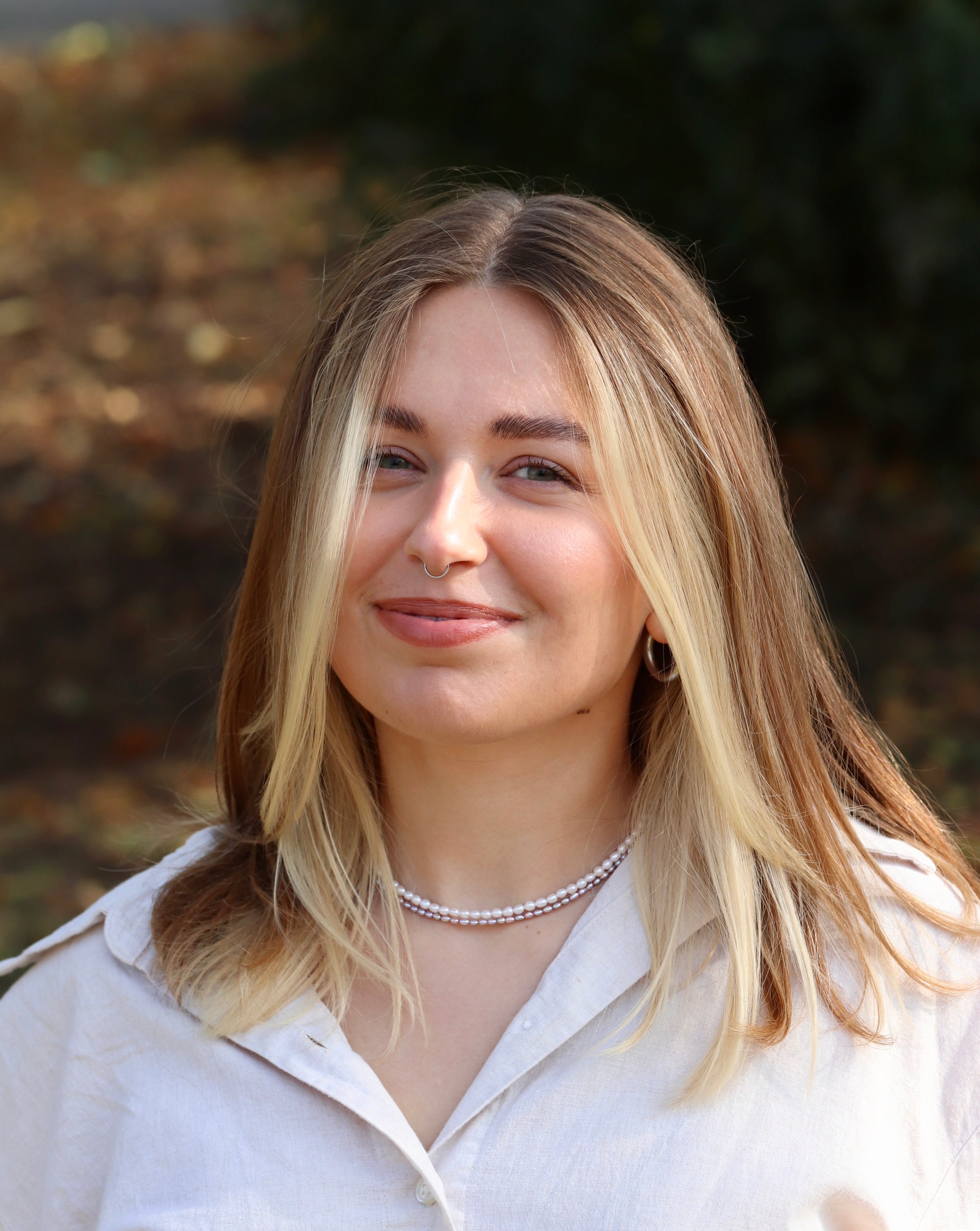 Bride wearing rose freshwater pearl necklace, elegant handmade wedding jewelry, perfect for bridal or bridesmaid gifts