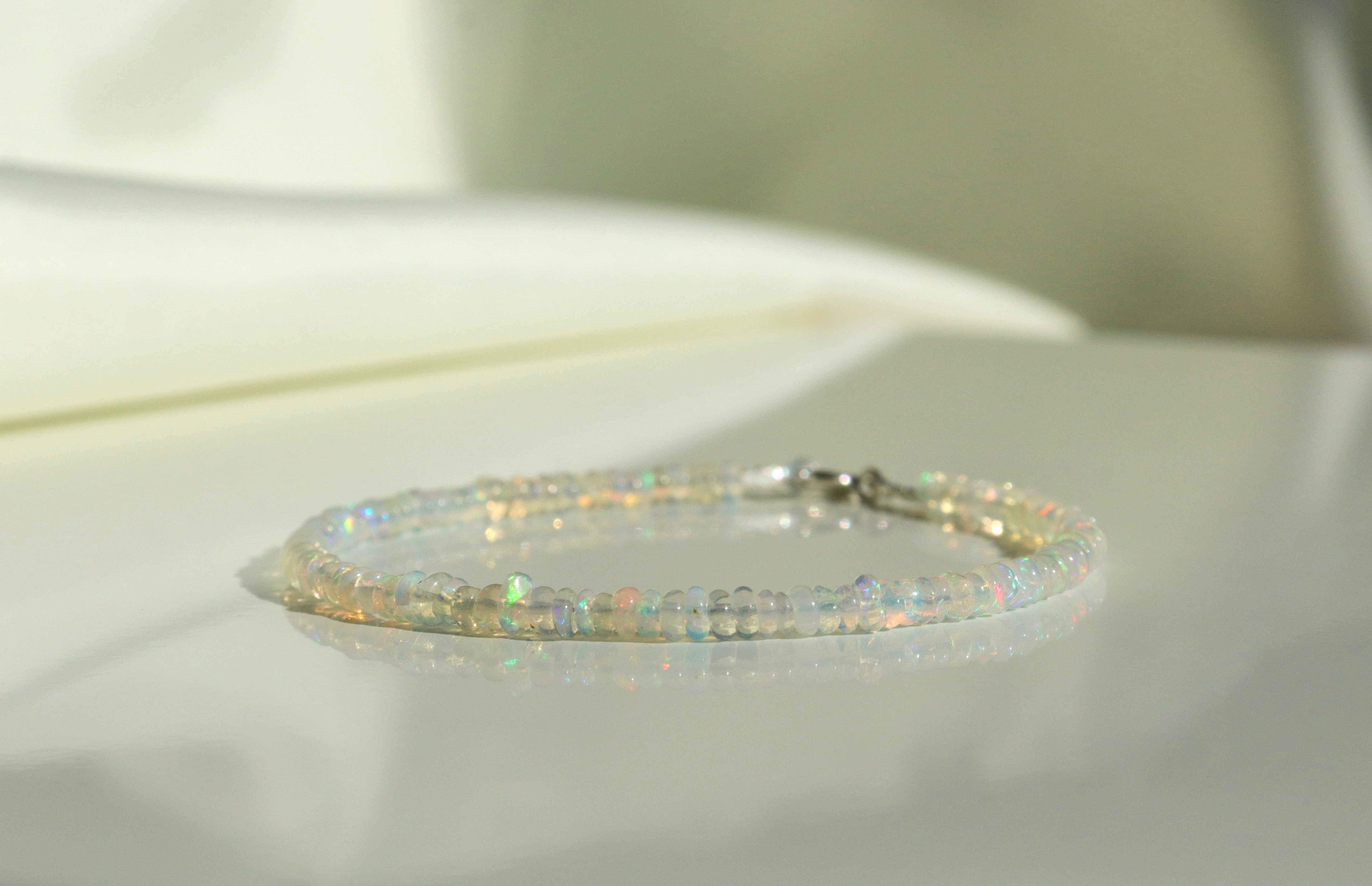 Dainty Ethiopian Opal bracelet, elegant handcrafted jewelry featuring natural color variations