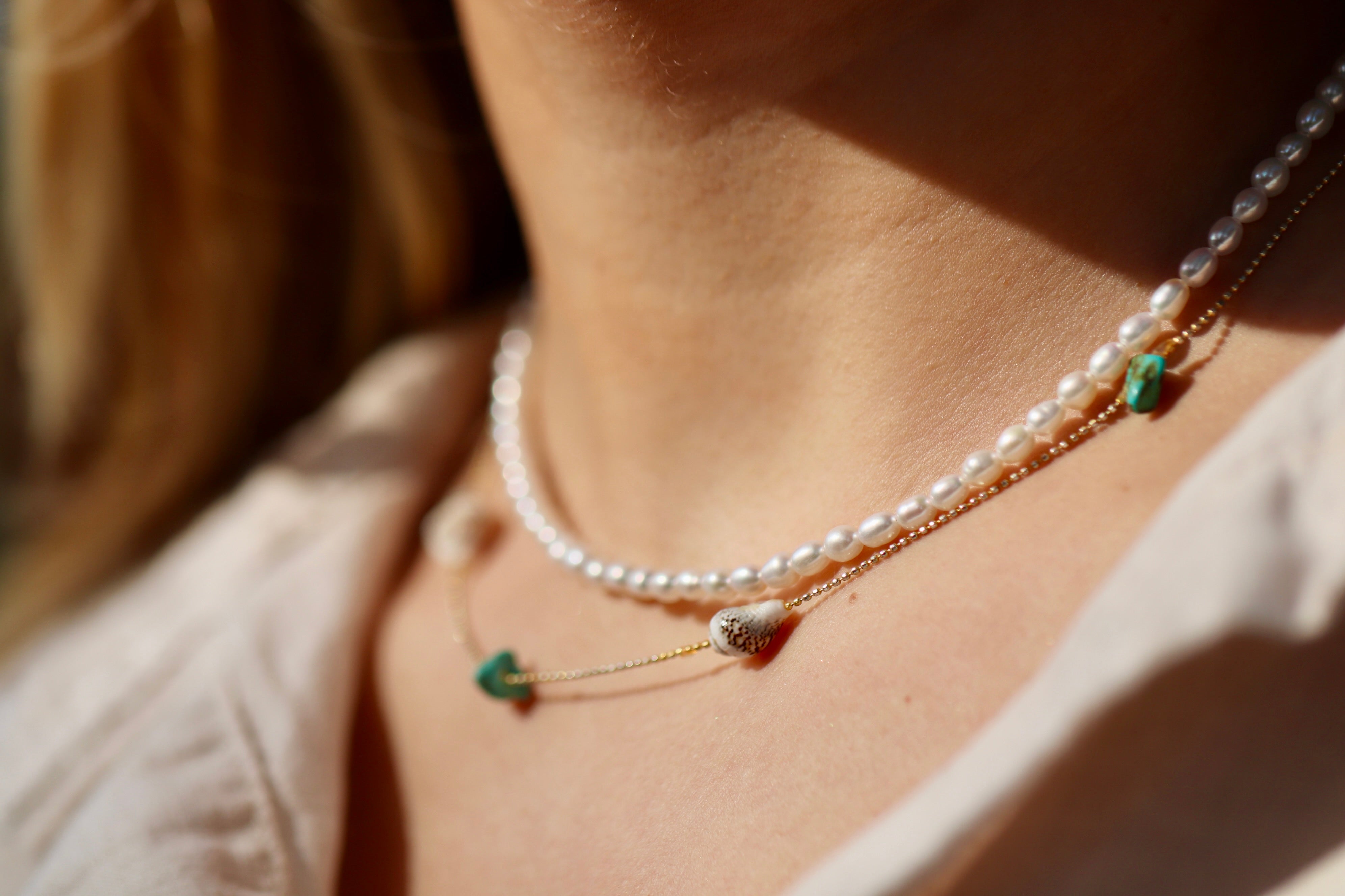 Dainty freshwater rice pearl necklace with gold filled details by Oberia Jewelry