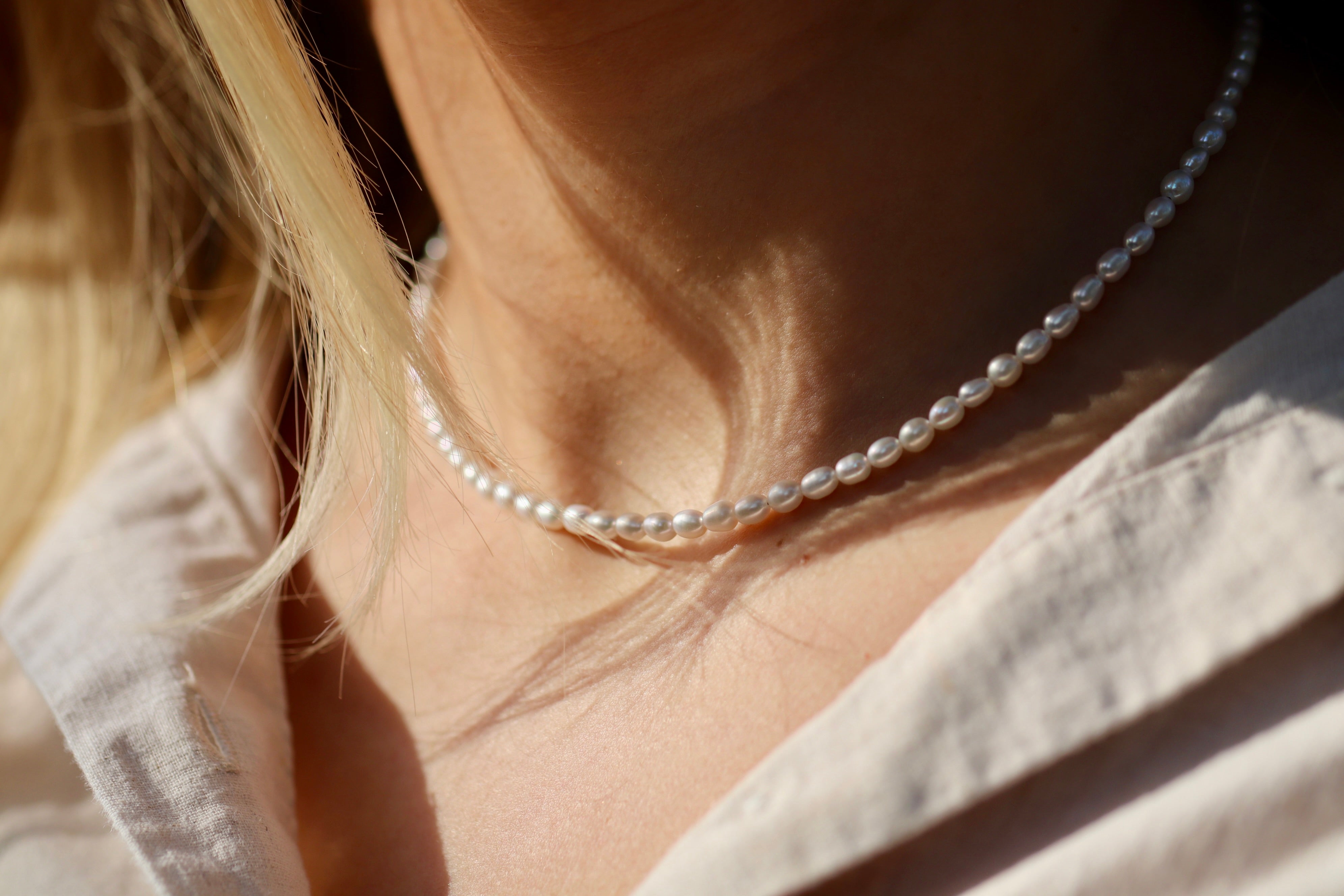Dainty freshwater rice pearl necklace by Oberia Jewelry