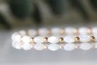 Dainty Mother of Pearl bracelet with golden beads