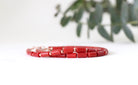 Dainty Red Coral bracelet featuring rose gold accents, timeless handmade jewelry