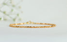 Dainty thin Karen Hill Tribe bracelet in 24k gold vermeil, elegant handcrafted design