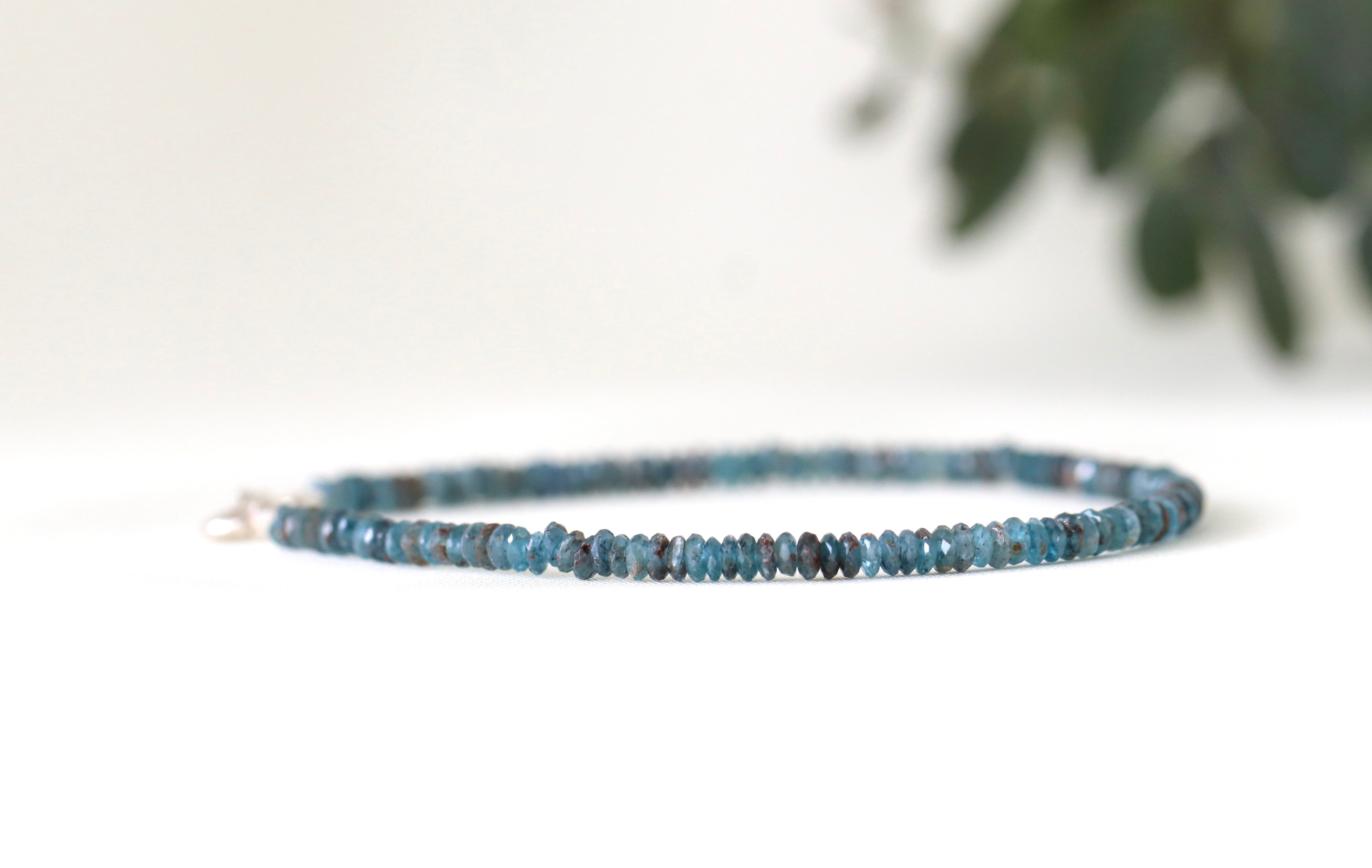 Elegant Dark Teal Blue Kyanite bracelet, minimalist design highlighting the gemstone’s luster