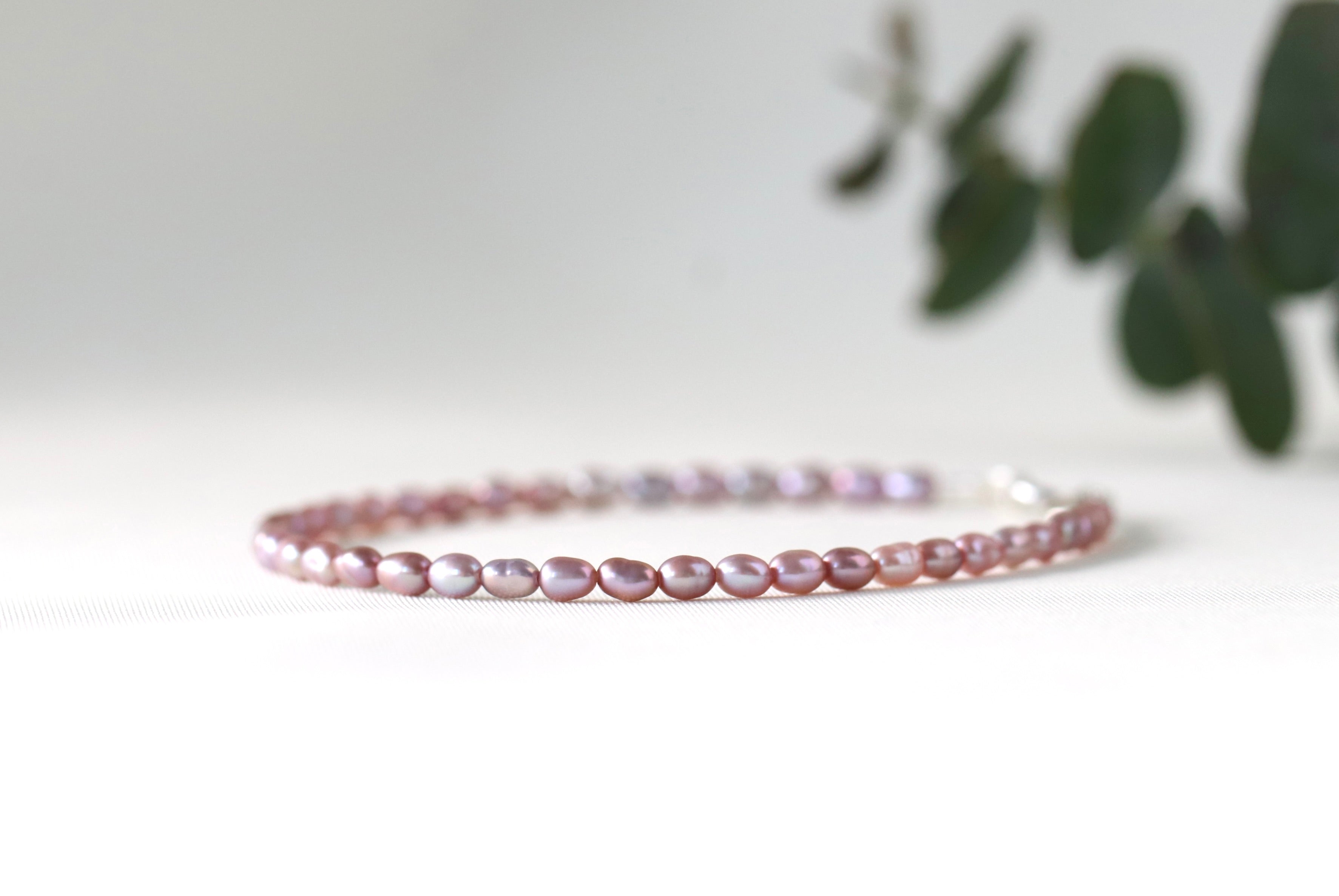 Elegant Rose Freshwater Pearl bracelet with silver accents, handcrafted by Oberia Jewelry