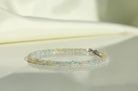 Handmade Ethiopian Opal bracelet, dainty minimalist jewelry with vibrant play-of-color by Oberia