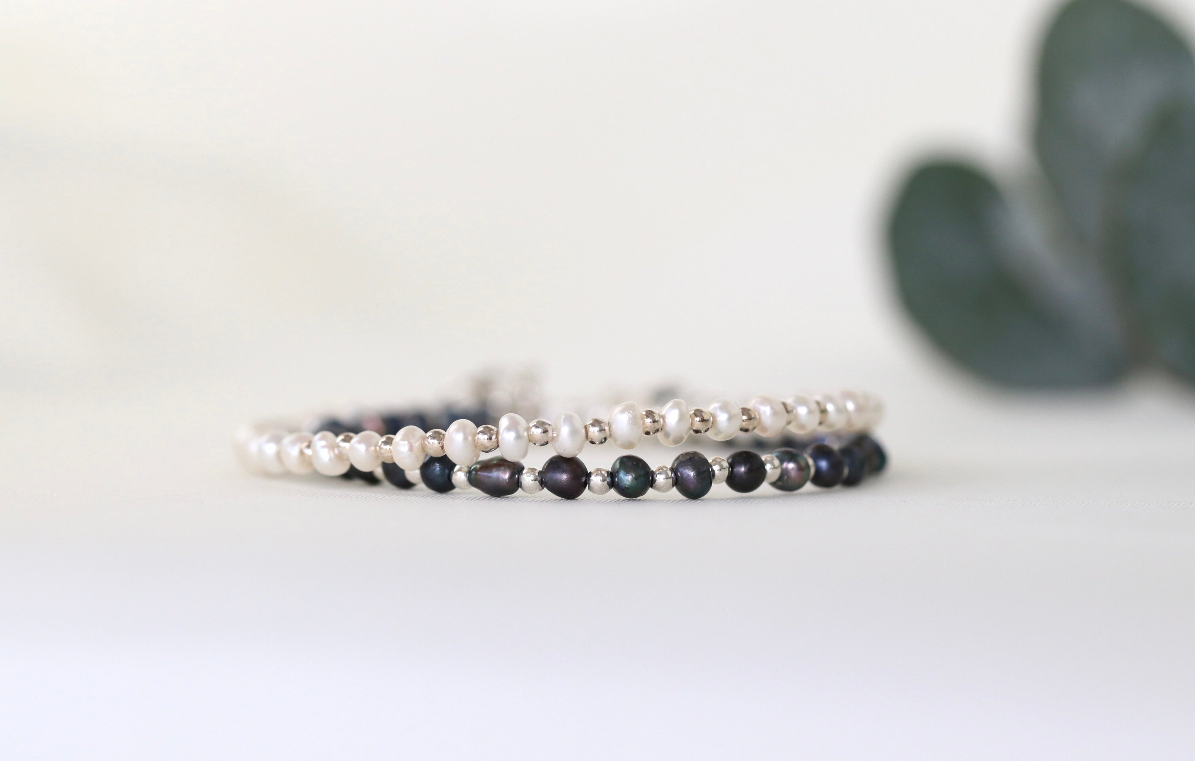 Minimalist Tahitian Black Pearl bracelet with sterling silver beads, refined handmade design