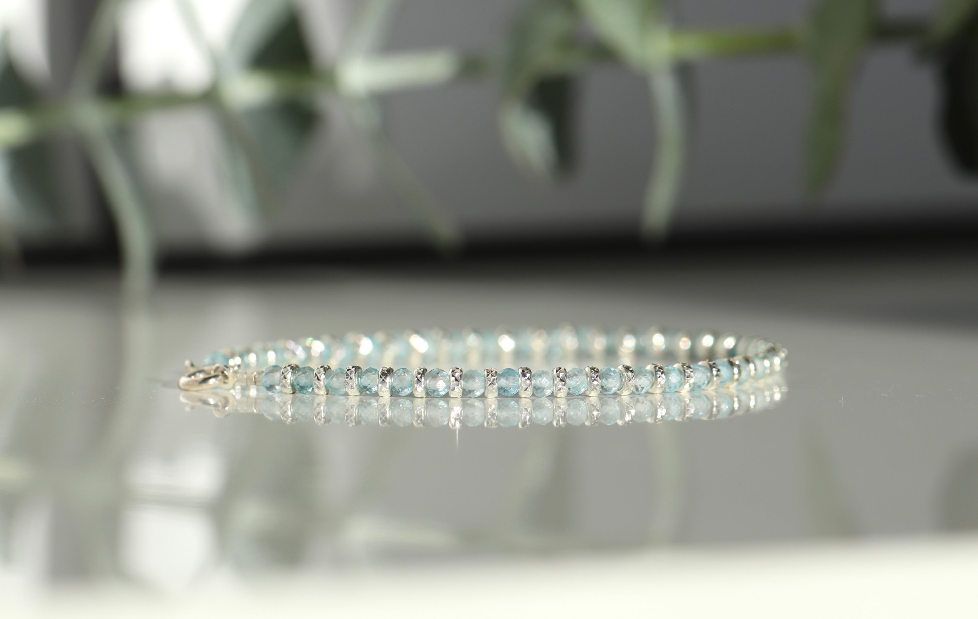Sparkling Blue Topaz bracelet with silver details